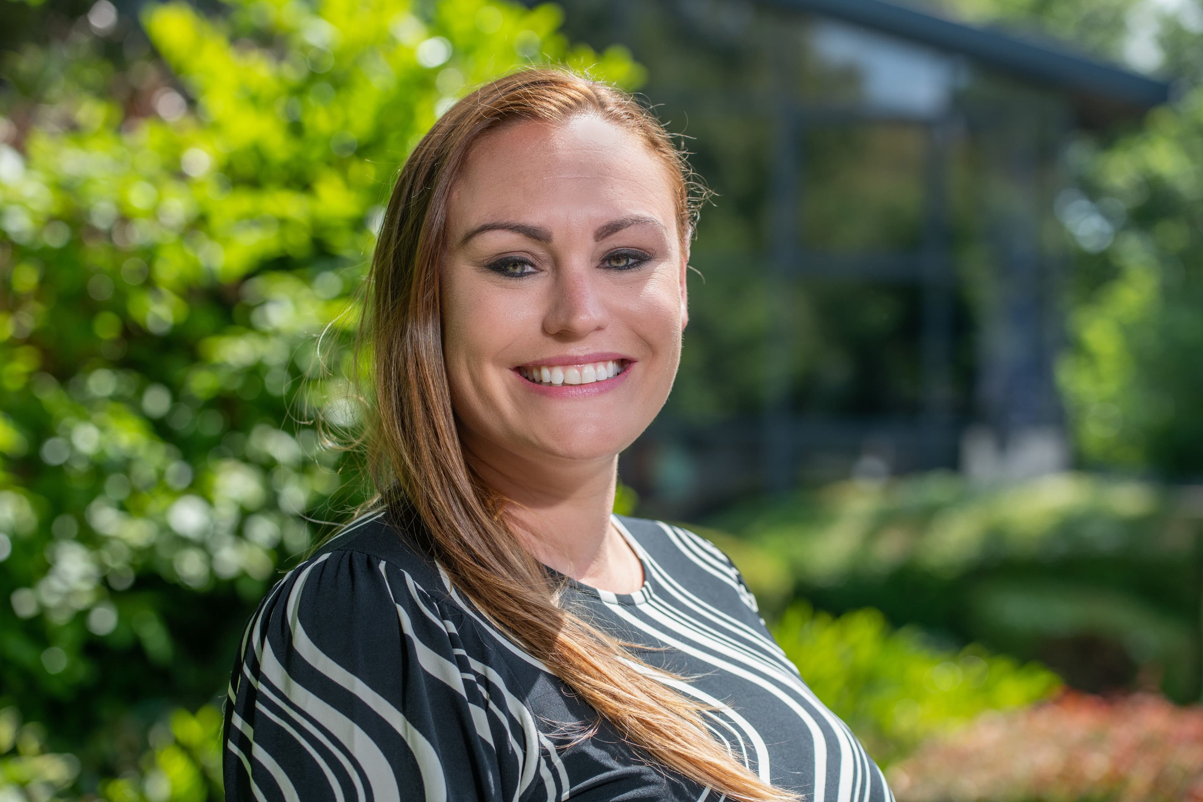 Sam, Associate Director of Customer Experience